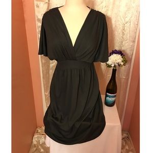 Dress. Mid length low V neck